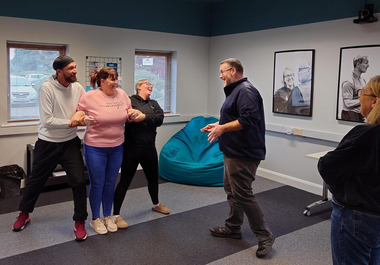 IKON Trainer James Adams assisting three learners in managing an exemplary difficult situation.